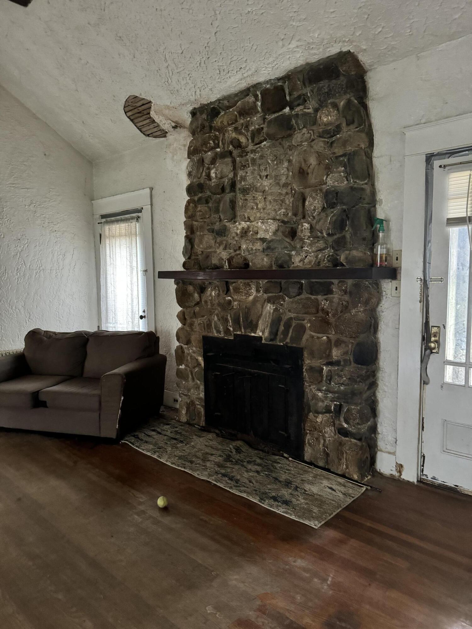 38 Nokomis Road Corinna, ME 04928 - Photo 7 of 12 living room fireplace
