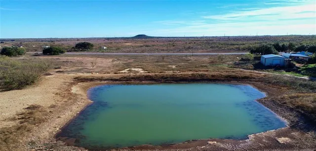 a view of a lake with a mountain in the back
