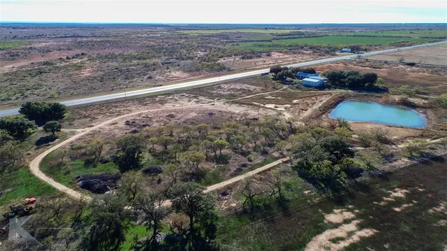 a view of a lake with beach