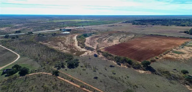 view of a dry yard with wooden fence