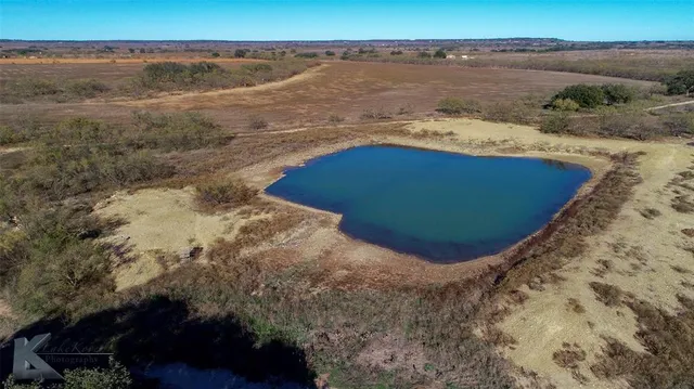 a view of a lake with beach and ocean view