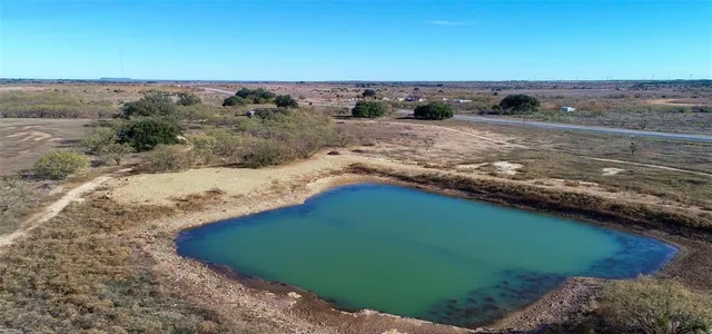 a view of a beach with a ocean view