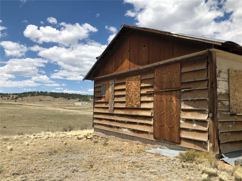 Tbd Tbd Ruby Gulch Road Como, CO 80432 - Photo 6 of 14 a front view of a house with a yard