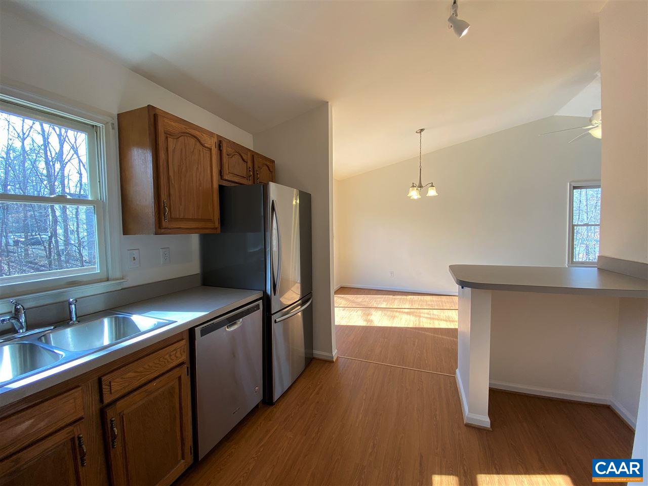49 Laguna Road Palmyra, VA 22963 - Photo 11 of 27 a kitchen with stainless steel appliances a refrigerator and a sink