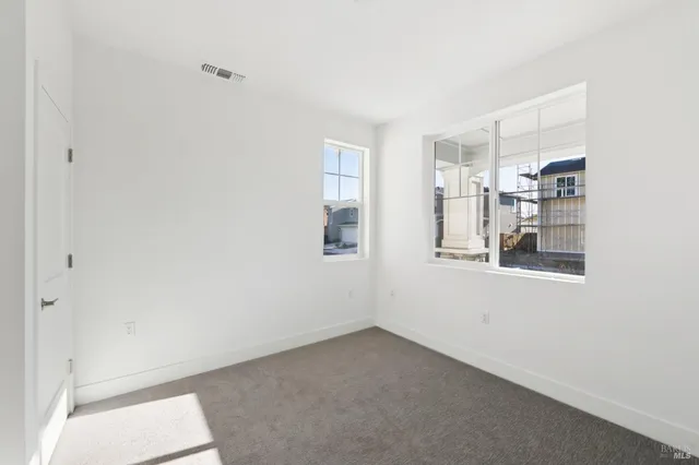 a view of a room that has a window in it