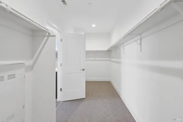 a view of empty room with windows