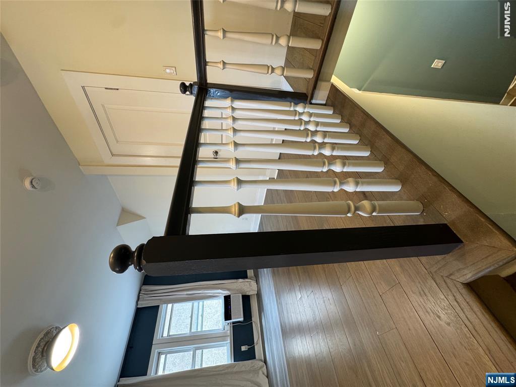 21 Valley Place, Unit 3 Edgewater, NJ 07020 - Photo 7 of 18 a view of hallway with stairs