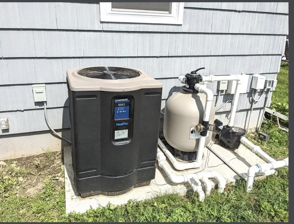 147 Forest Street Middleton, MA 01949 - Photo 17 of 32 a bathroom with a sink and mirror