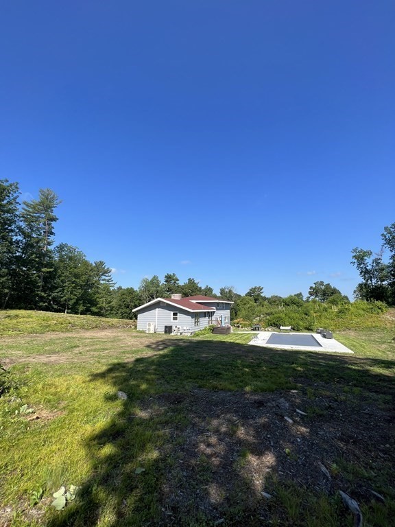 147 Forest Street Middleton, MA 01949 - Photo 29 of 32 a view of a field with an ocean