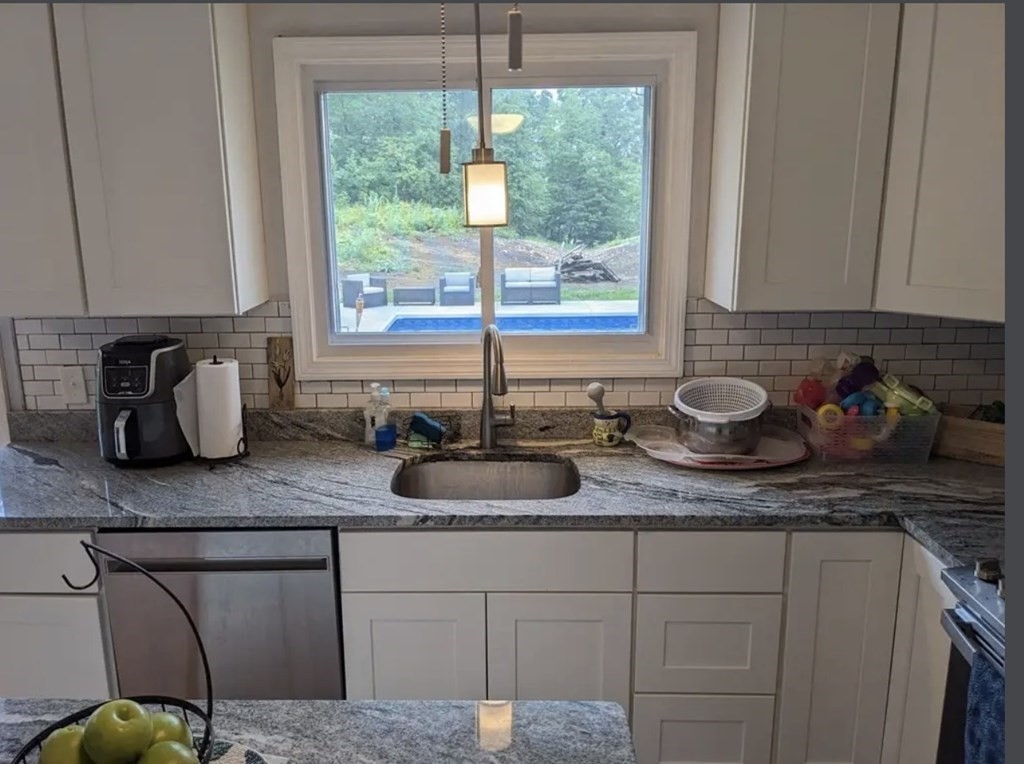 147 Forest Street Middleton, MA 01949 - Photo 5 of 32 a kitchen with sink and window