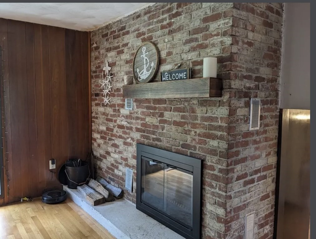 147 Forest Street Middleton, MA 01949 - Photo 7 of 32 a room with fireplace