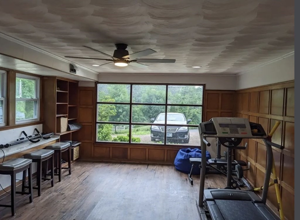 147 Forest Street Middleton, MA 01949 - Photo 9 of 32 a view of a workspace with furniture and a window