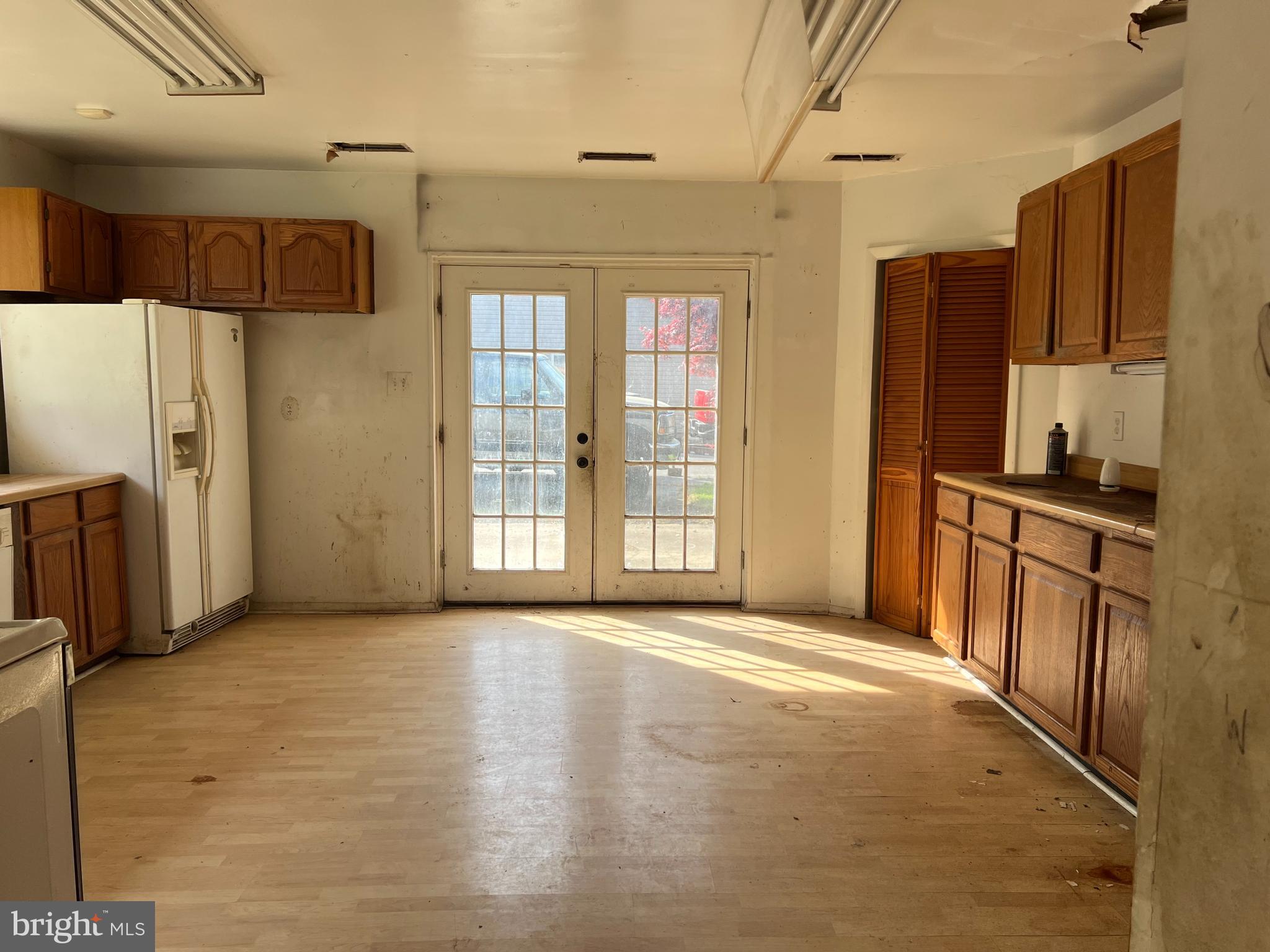 6705 Bumpy Oak Road La Plata, MD 20646 - Photo 16 of 36 a view of a kitchen with refrigerator and windows