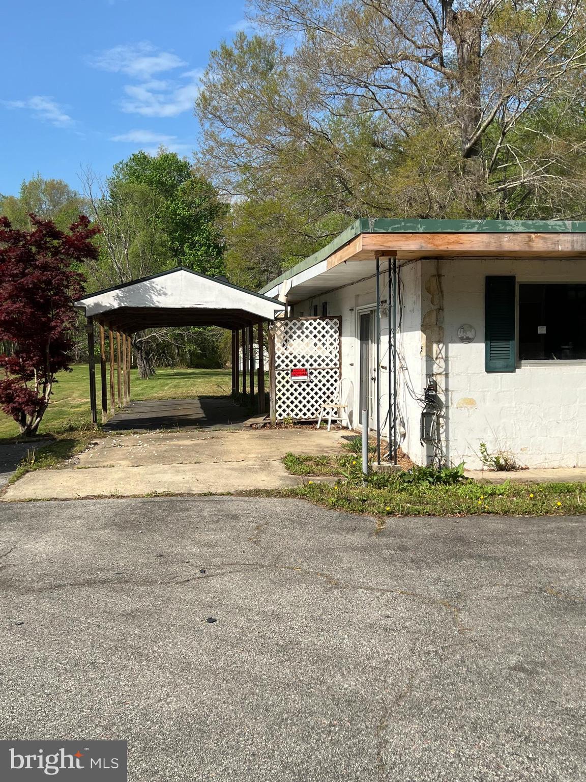 6705 Bumpy Oak Road La Plata, MD 20646 - Photo 24 of 36 a front view of a house with a yard