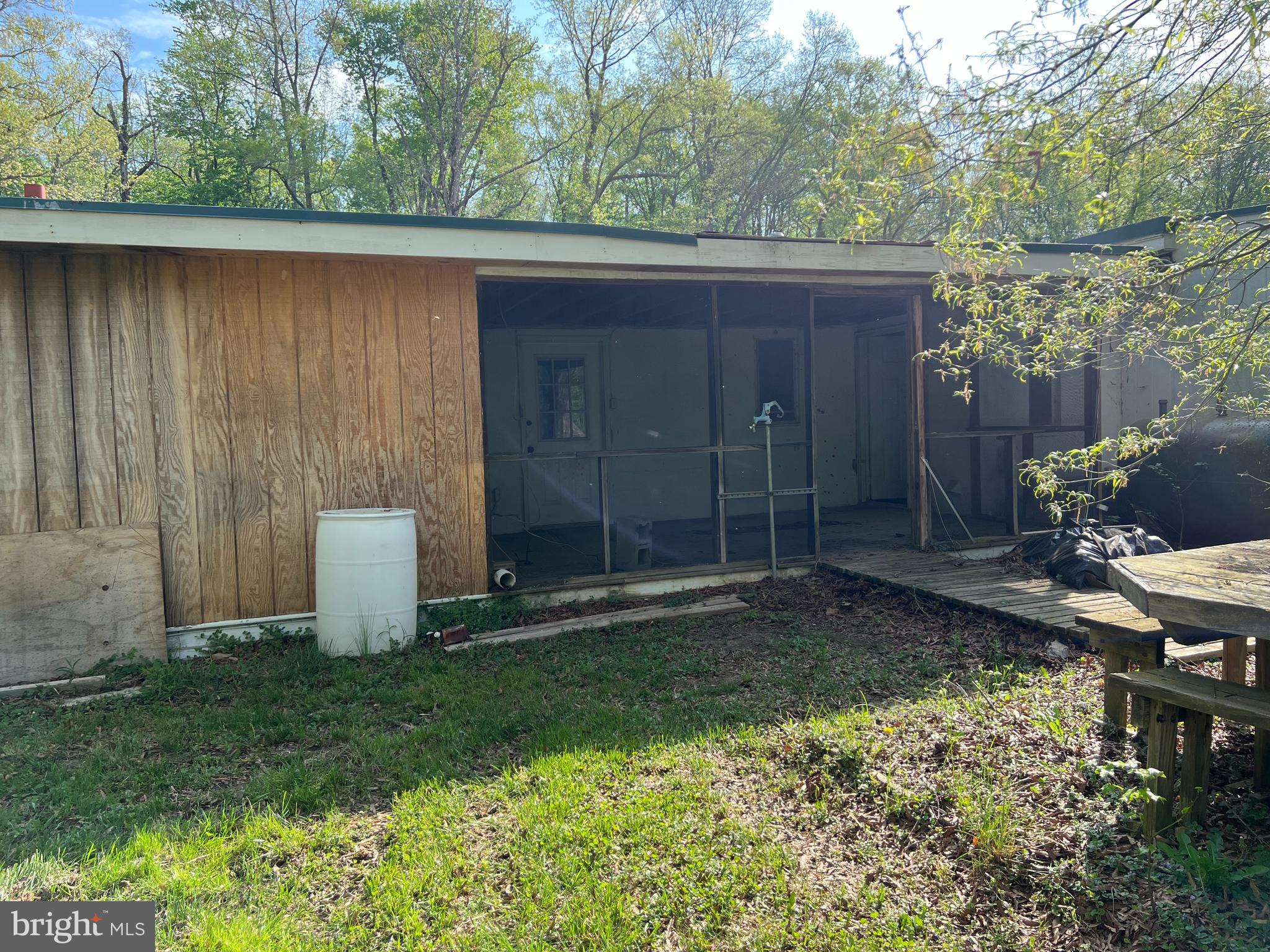 6705 Bumpy Oak Road La Plata, MD 20646 - Photo 25 of 36 a backyard of a house with lots of green space