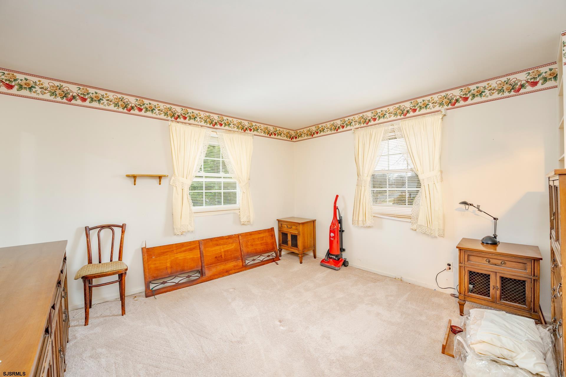 163 Jordan Road Somers Point, NJ 08244 - Photo 31 of 50 a bedroom with furniture and a window
