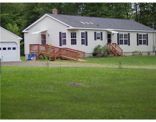 770 Upper Bellsqueeze Road Clinton, ME 04927 - Photo 11 of 25 Exterior Front. sky lights - nice...