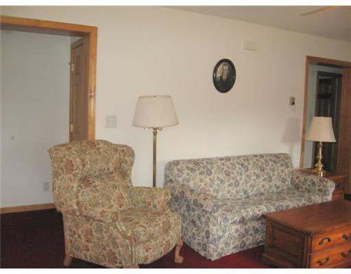 770 Upper Bellsqueeze Road Clinton, ME 04927 - Photo 21 of 25 Living Room. Master bedroom and bath...