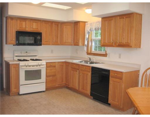 770 Upper Bellsqueeze Road Clinton, ME 04927 - Photo 3 of 25 Kitchen. with appliances and skylights
