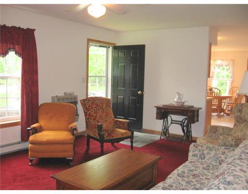 770 Upper Bellsqueeze Road Clinton, ME 04927 - Photo 10 of 25 Living Room.