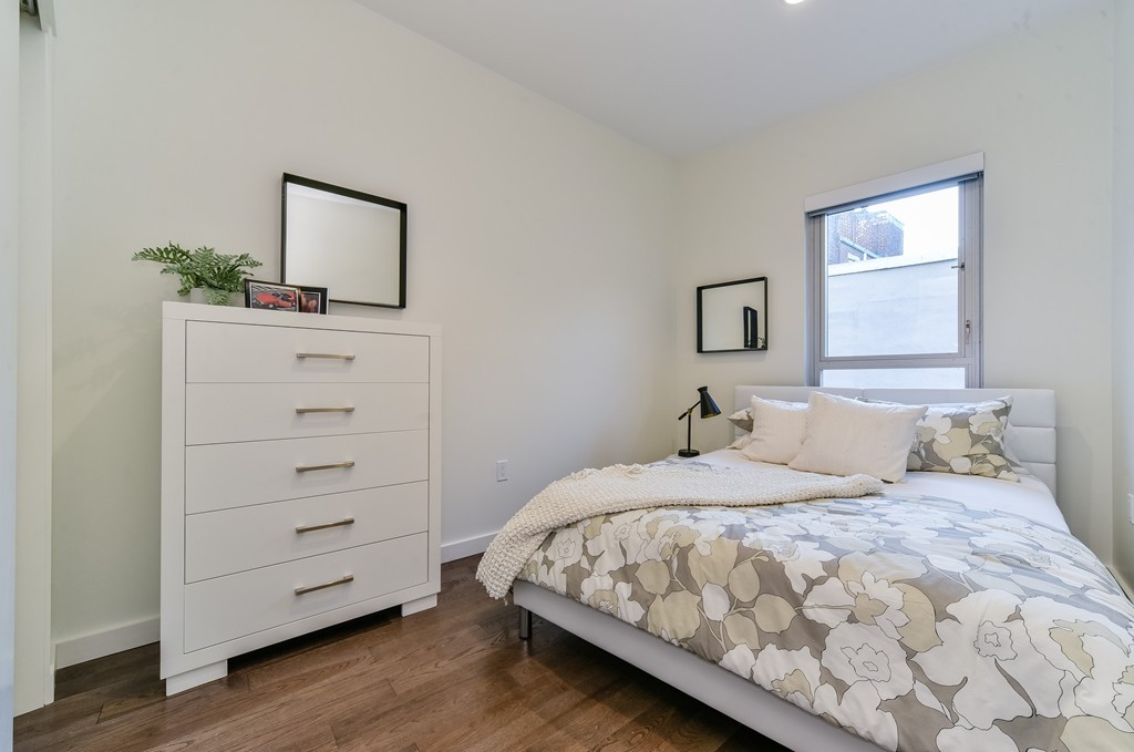 126 Salem Street, Unit 3 Boston, MA 02113 - Photo 6 of 14 a bedroom with a bed and a dresser
