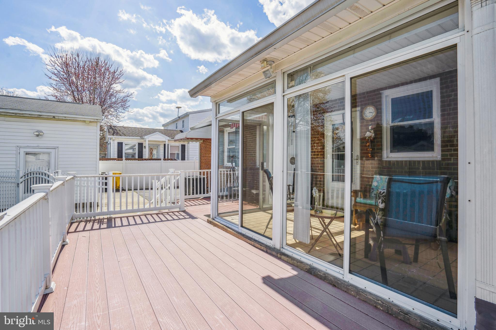 163 Kenwood Road Pasadena, MD 21122 - Photo 6 of 25 Trex like Deck, vinyl fencing and brick ext