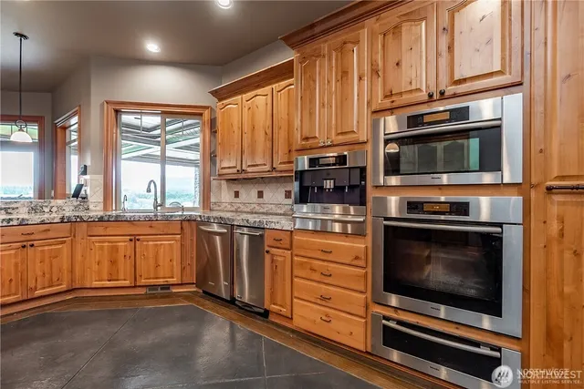 a view of a livingroom with furniture and front door