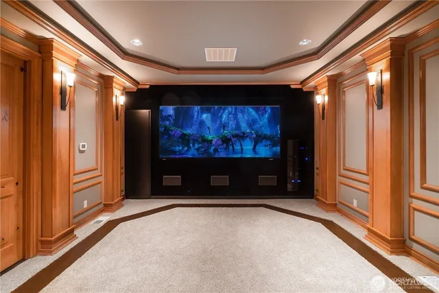 a spacious bedroom with a bed and a large window