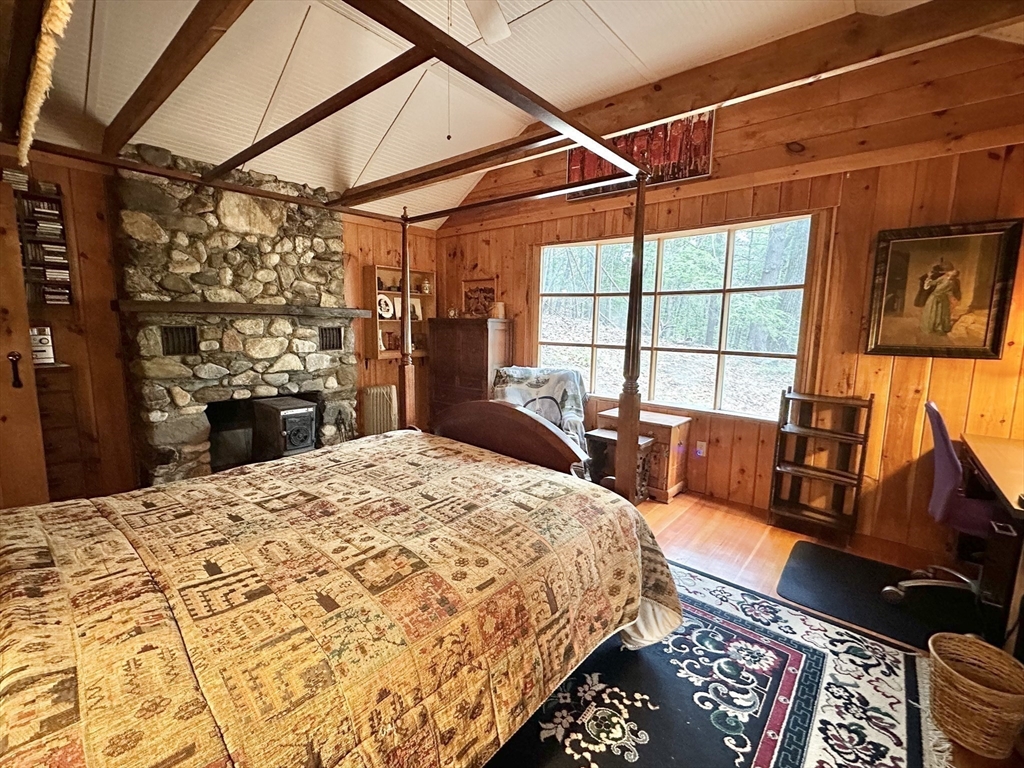 7 Burt Road Westhampton, MA 01027 - Photo 23 of 31 a bed room with a bed and a couch