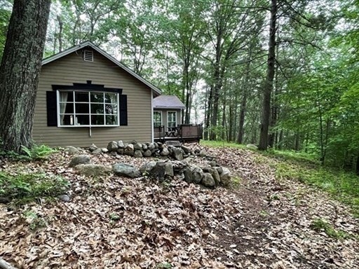 7 Burt Road Westhampton, MA 01027 - Photo 26 of 31 a front view of a house with a garden