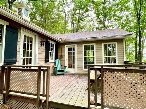 7 Burt Road Westhampton, MA 01027 - Photo 3 of 31 a view of a house with backyard and sitting area