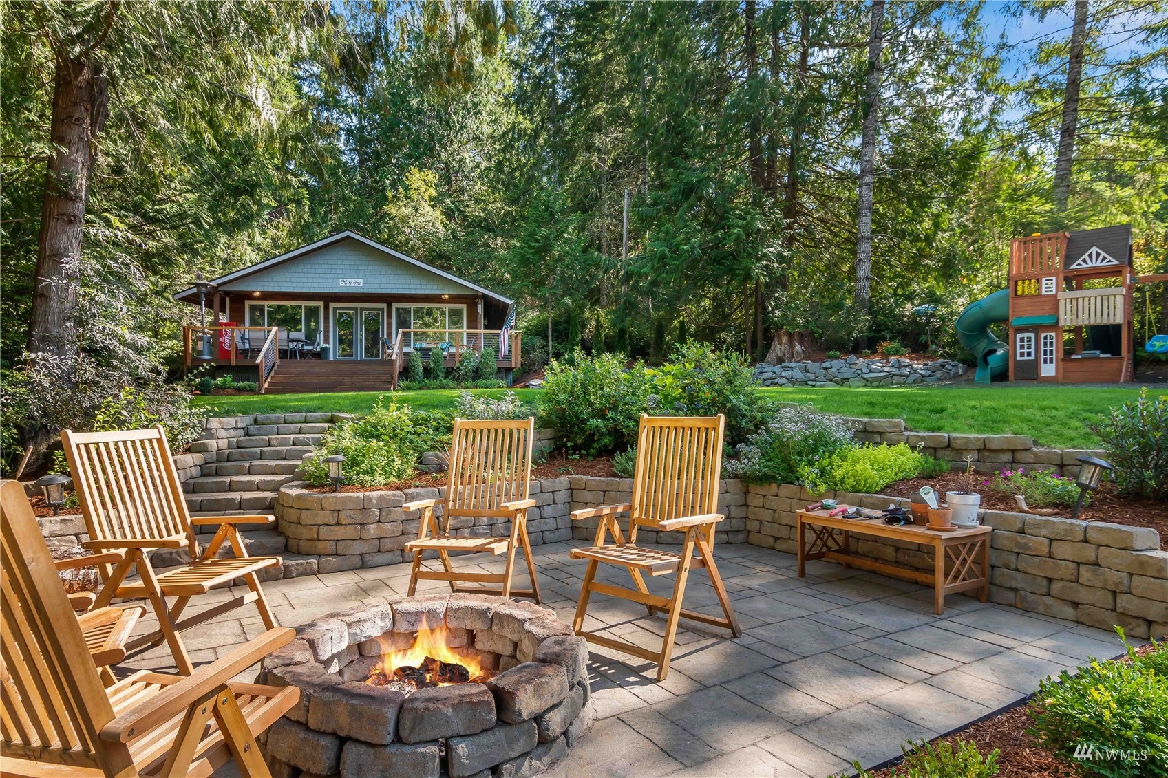 51 East Canyon View Road Belfair, WA 98528 - Photo 1 of 35 a view of a patio with a chairs in a patio