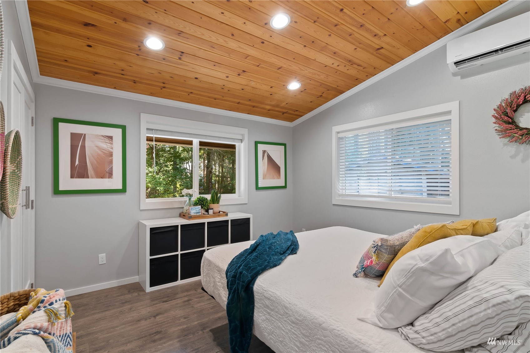 51 East Canyon View Road Belfair, WA 98528 - Photo 12 of 35 a bedroom with a large bed and a window