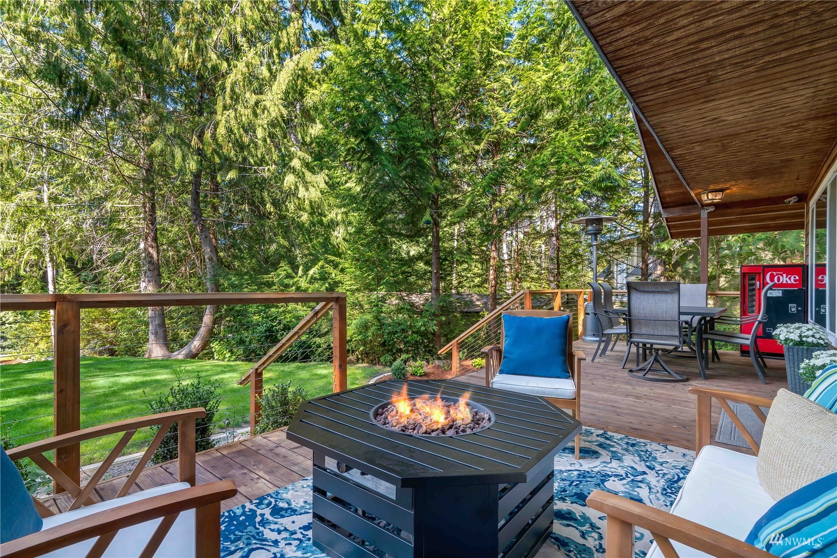51 East Canyon View Road Belfair, WA 98528 - Photo 20 of 35 a view of a deck with furniture and a potted plants