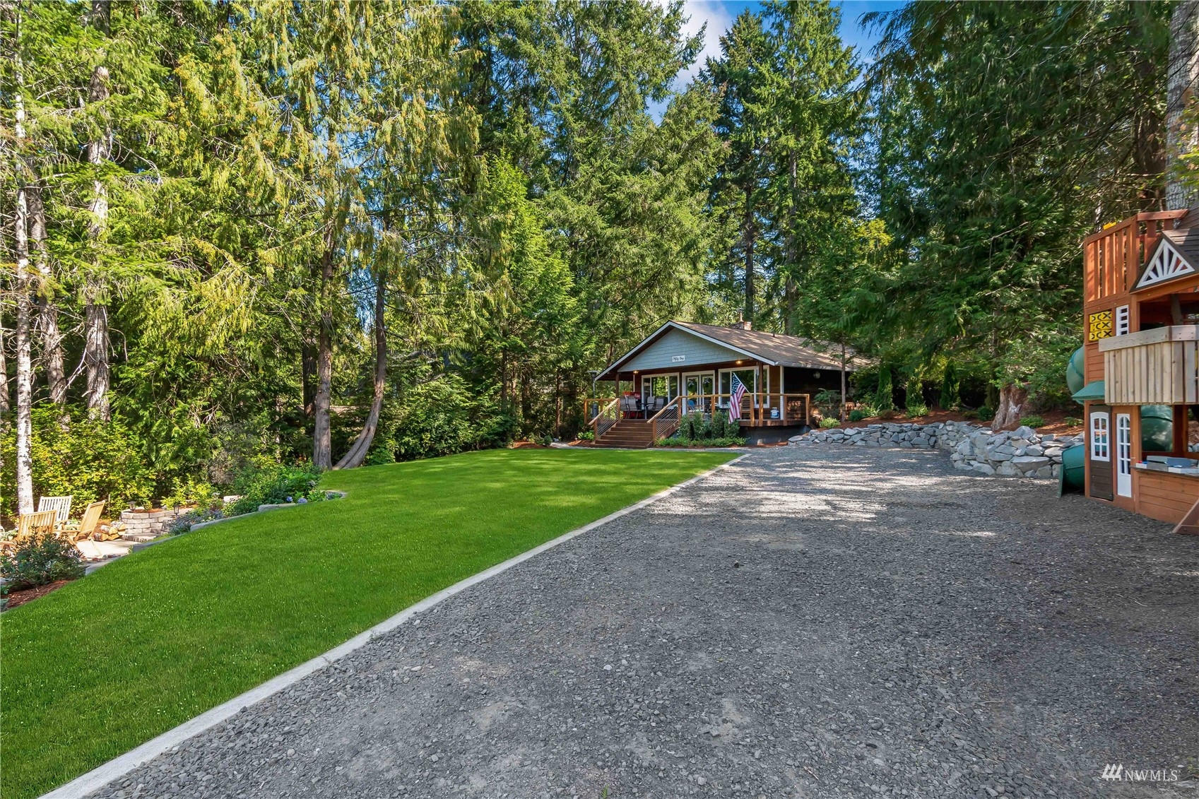 51 East Canyon View Road Belfair, WA 98528 - Photo 21 of 35 a front view of a house with garden