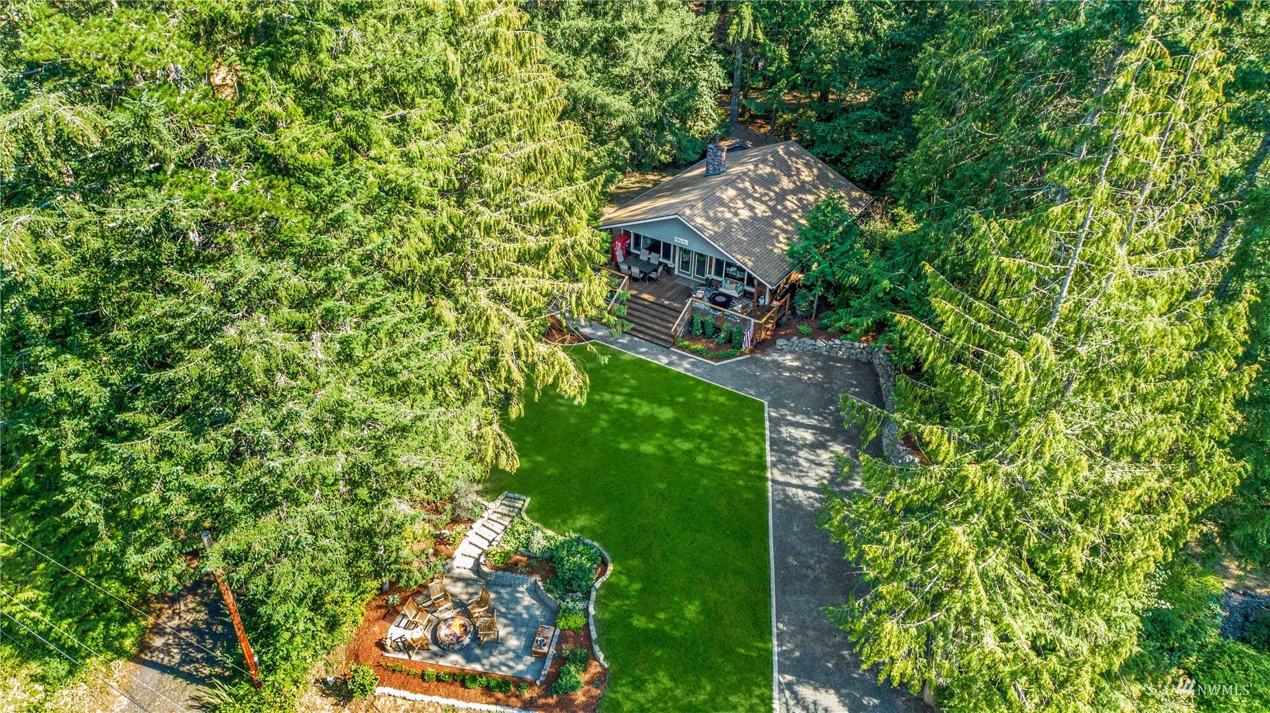 51 East Canyon View Road Belfair, WA 98528 - Photo 30 of 35 a view of a house with a yard