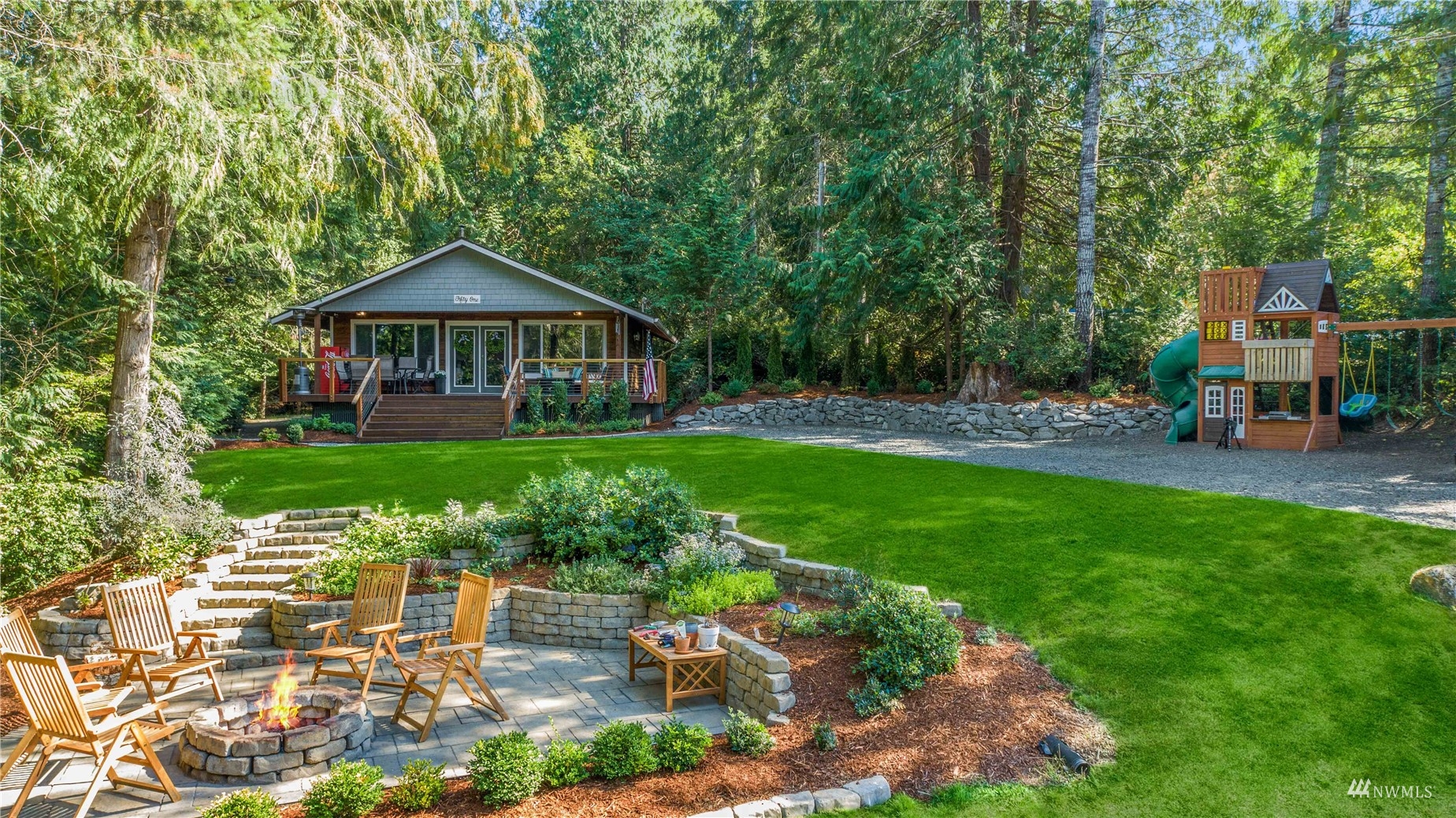 51 East Canyon View Road Belfair, WA 98528 - Photo 31 of 35 a front view of a house with garden