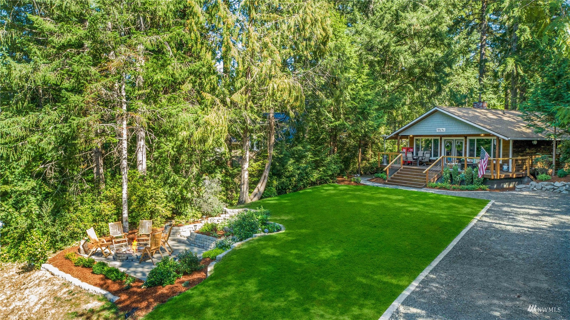 51 East Canyon View Road Belfair, WA 98528 - Photo 32 of 35 a view of an house with backyard space and balcony