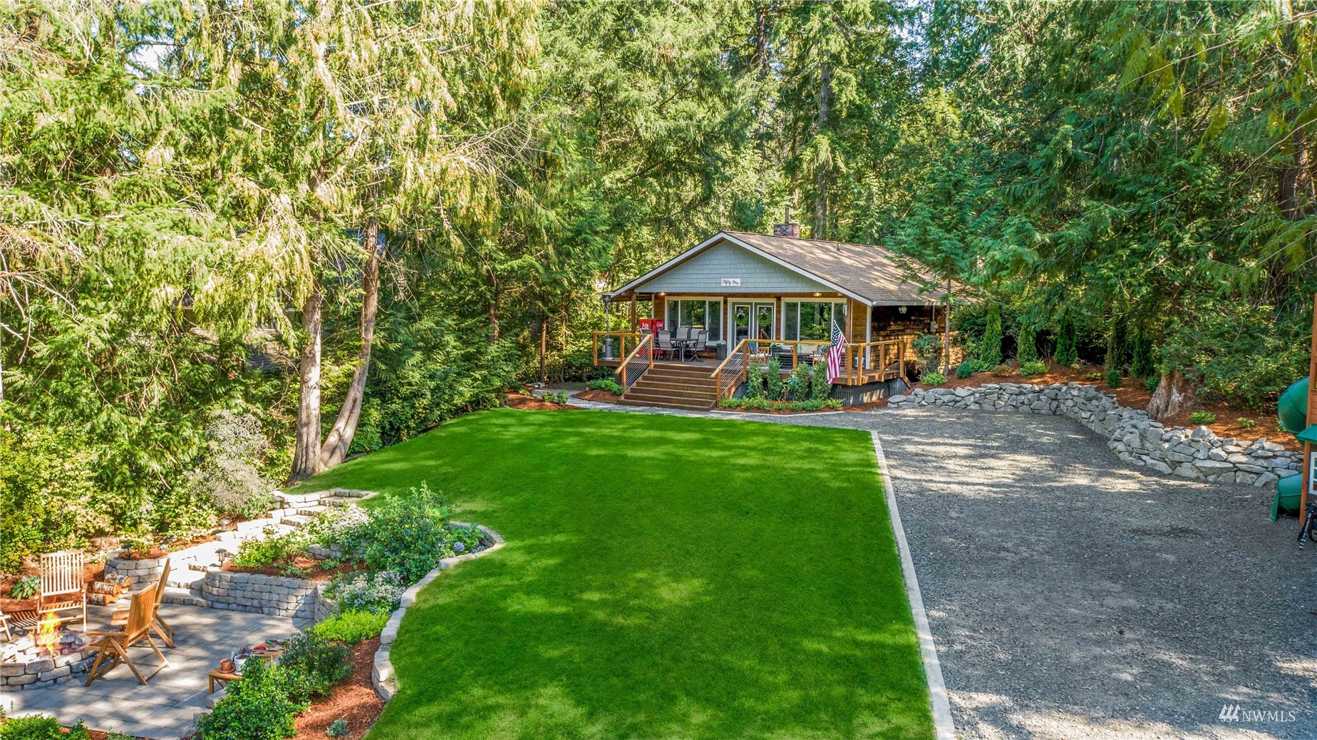 51 East Canyon View Road Belfair, WA 98528 - Photo 33 of 35 a front view of a house with yard and green space