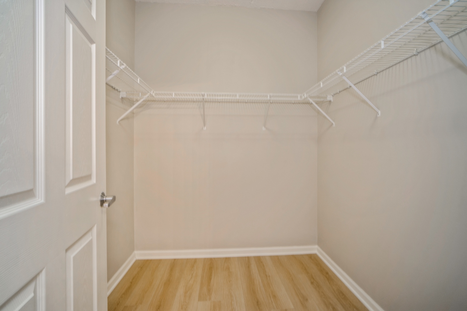 715 Astor Lane, Unit 402 Wheeling, IL 60090 - Photo 8 of 12 a view of an empty walk in closet