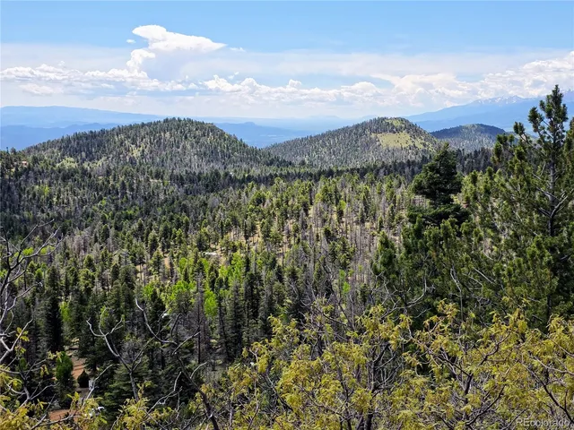 a view of mountain with sunset view