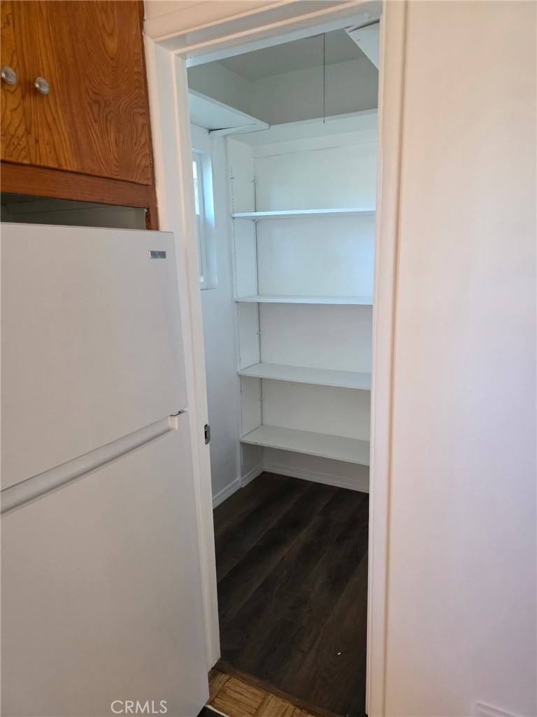 928 West Angeleno Avenue, Unit C Burbank, CA 91506 - Photo 4 of 14 a view of walk in closet with empty racks