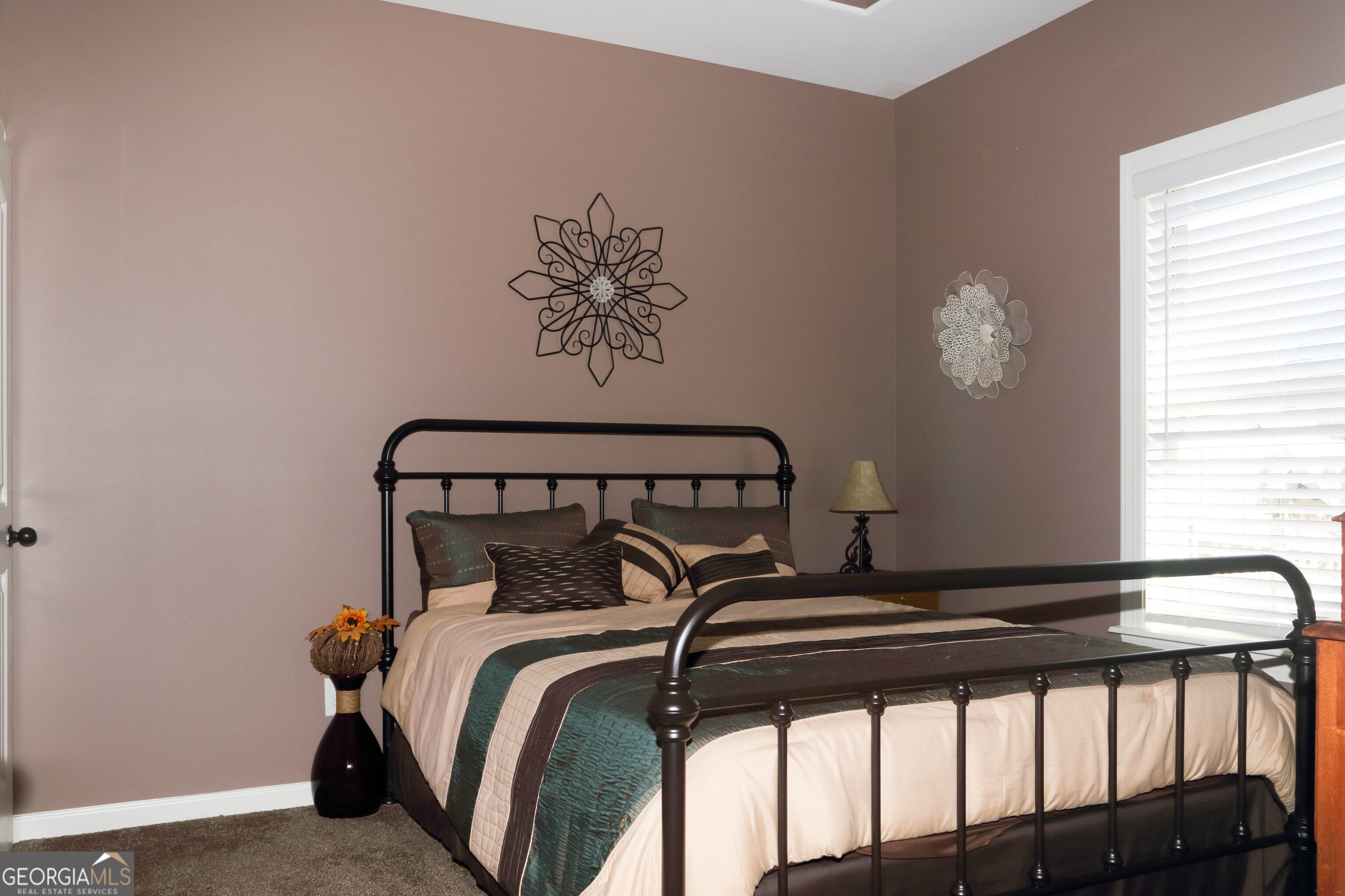 107 Westchester Trail Kathleen, GA 31047 - Photo 21 of 36 a bedroom with a bed and a window