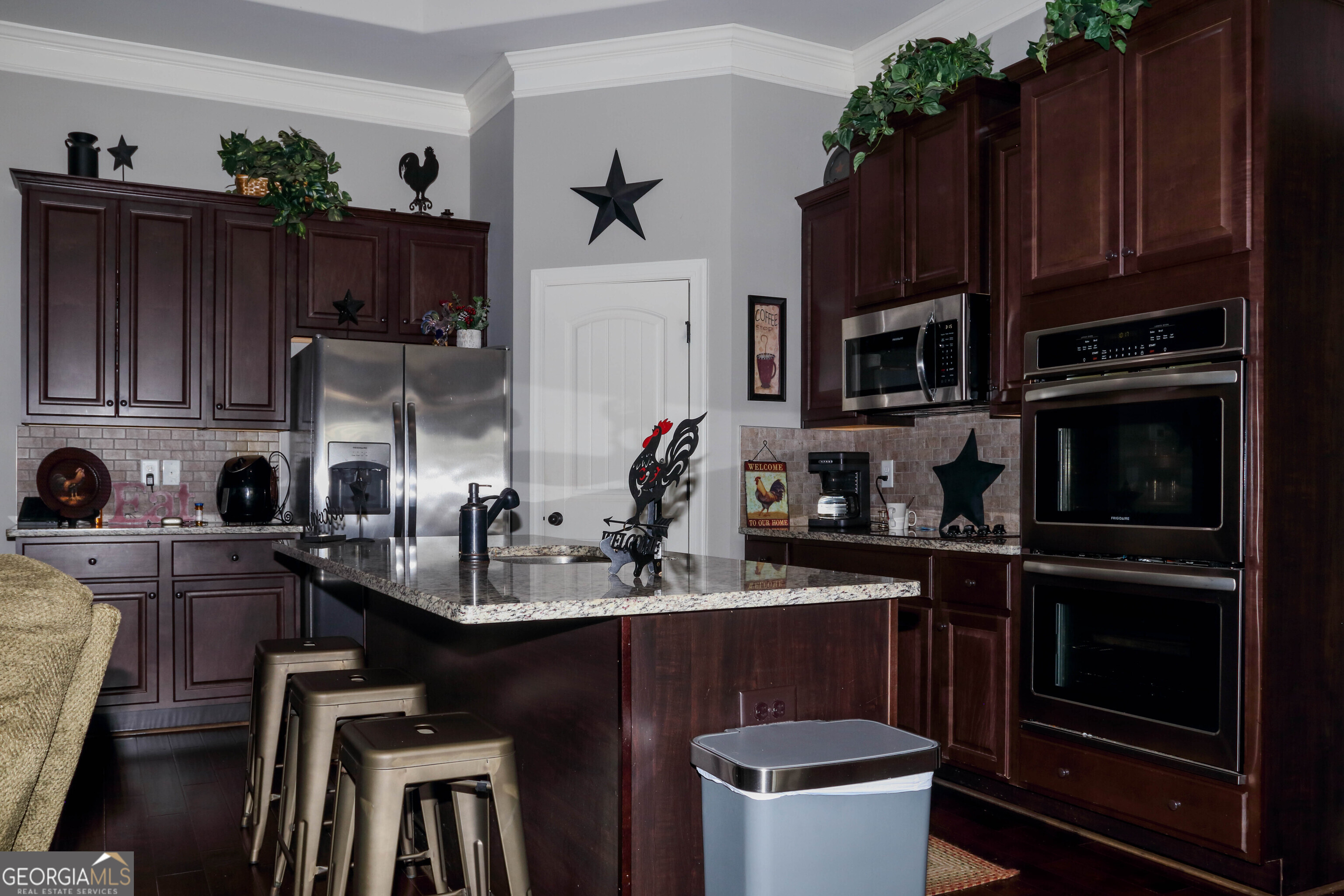 107 Westchester Trail Kathleen, GA 31047 - Photo 7 of 36 a kitchen with a sink appliances and cabinets