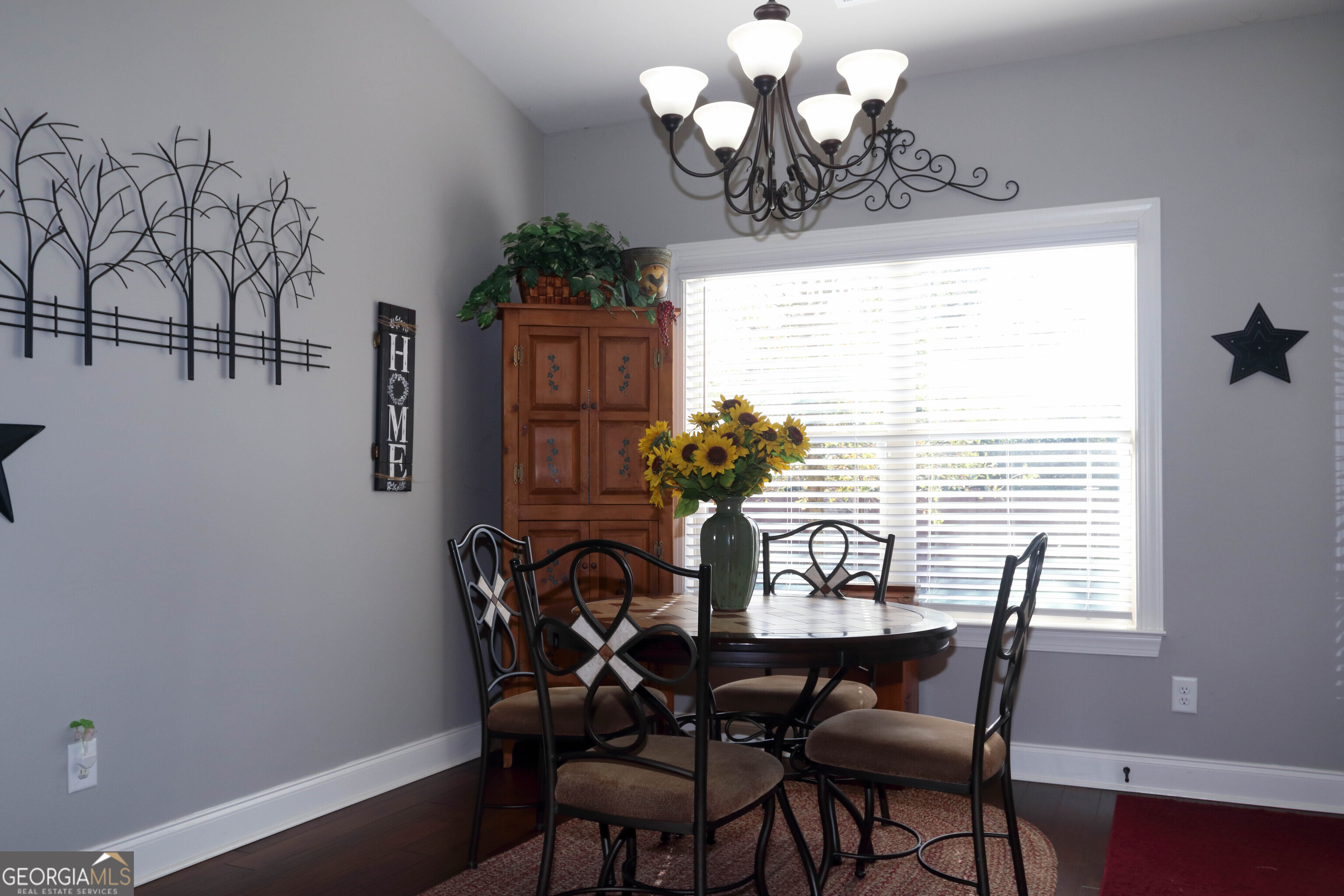 107 Westchester Trail Kathleen, GA 31047 - Photo 9 of 36 a view of a dining room with furniture and chandelier