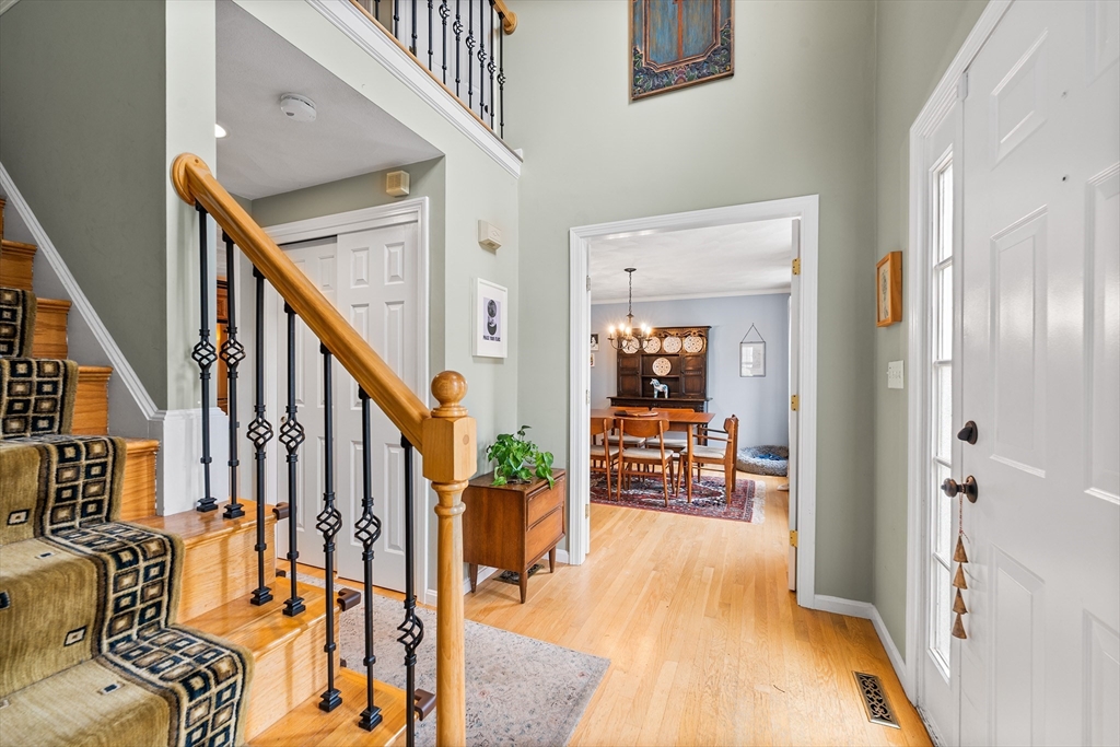 40 Station Road Salem, MA 01970 - Photo 15 of 36 a view of an entryway with dining room and stairs