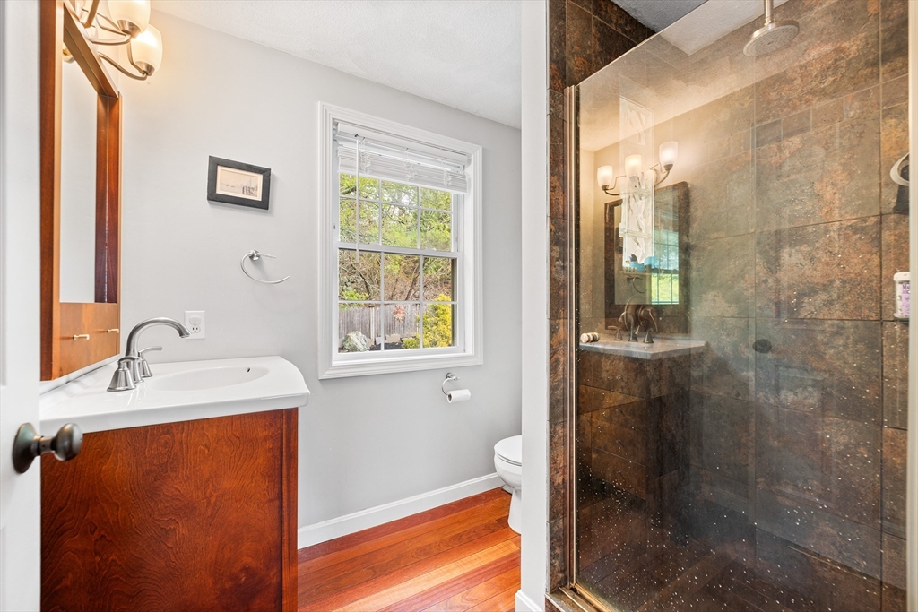 40 Station Road Salem, MA 01970 - Photo 20 of 36 a bathroom with a sink a toilet and shower