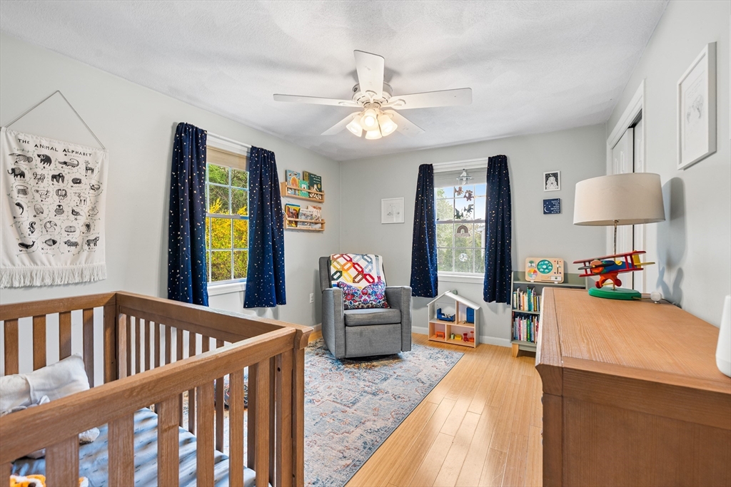 40 Station Road Salem, MA 01970 - Photo 23 of 36 a bedroom with furniture and a large window