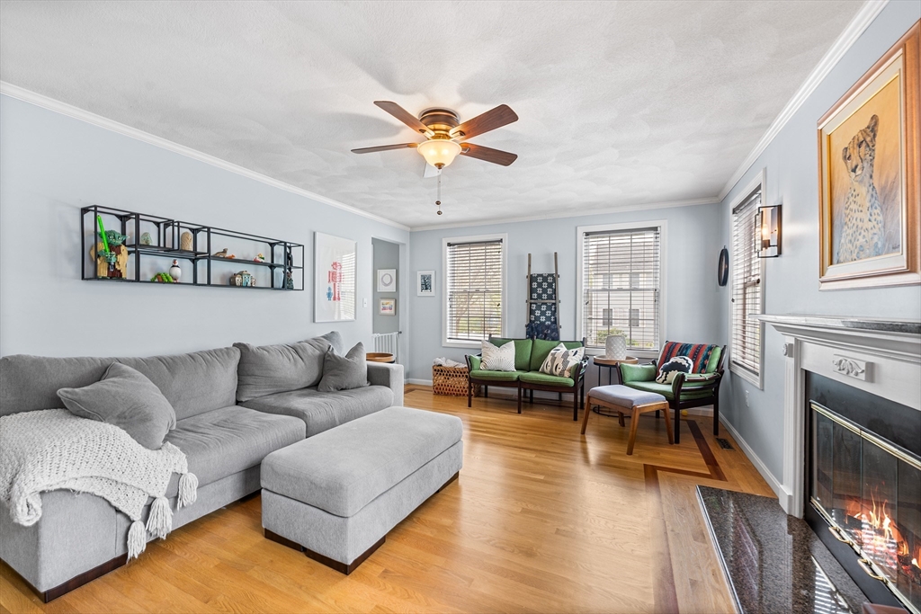 40 Station Road Salem, MA 01970 - Photo 3 of 36 a living room with furniture wooden floor and a fireplace