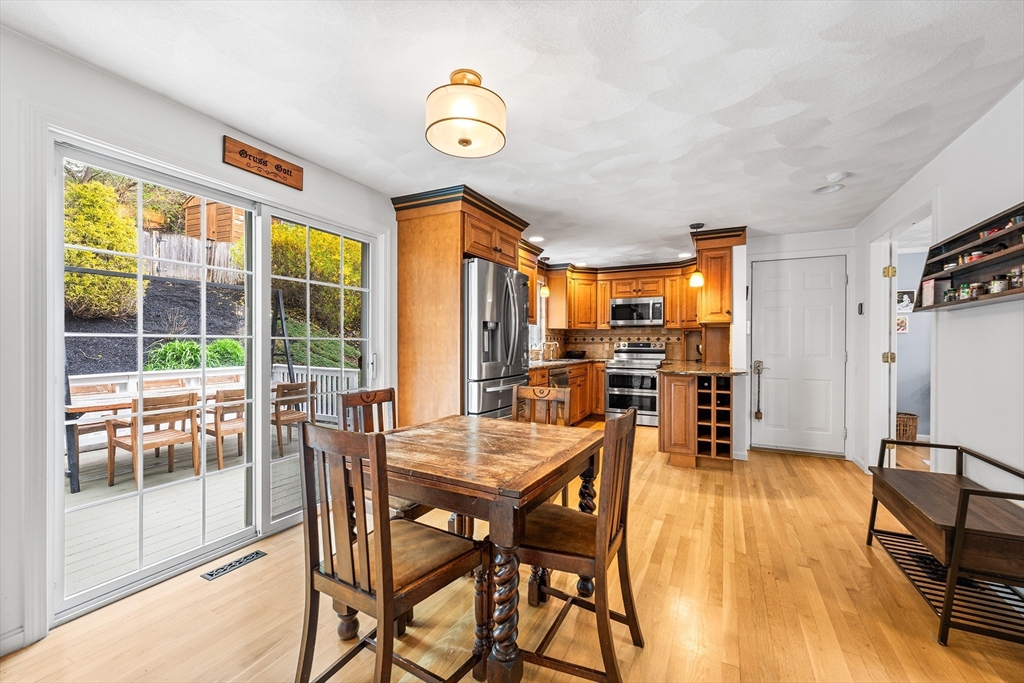 40 Station Road Salem, MA 01970 - Photo 8 of 36 a view of a dining room with furniture window and wooden floor